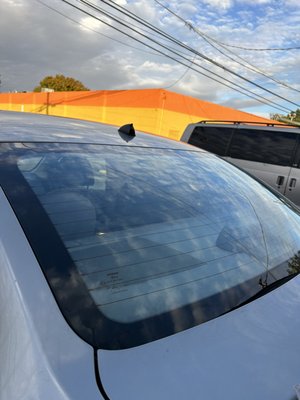 Back Window Tint Before/After - 15% on back window tint on a Nissan Altima. Back Window Tint Before/After - 15% on back window tint on a Nissan Altima.