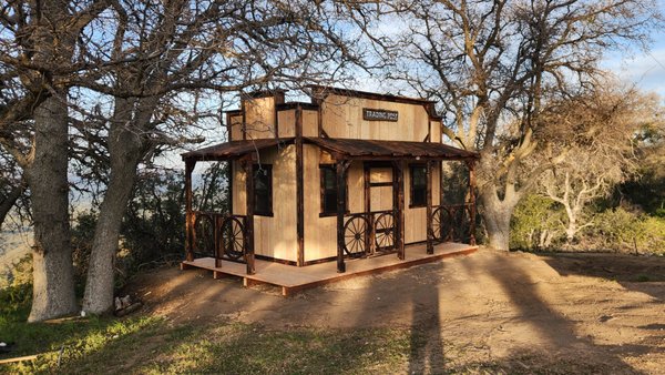8x15' Cowboy Rustic Western Shed with Porch in Los Angeles County, CA - This beautiful 8x15' Rustic Cowboy Western Shed is one of our most popular styles, combining classic western charm with practical storage space. Featuring our signature rustic design, this custom shed offers the perfect blend of style and function for backyard storage, workshops, hobby rooms, bar areas, entertainment spaces, or just about anything you can imagine.
These versatile buildings are designed to add both function and character to your property and have even been featured in movies, commercials, and television productions over the years.
Built on-site by our experienced in-house crews, the Rustic Cowboy series is designed for homeowners who want more than just a standard storage shed. With its unique character, durable construction, and customizable options, this shed adds both value and curb appeal to any property.
At Shed World, we specialize in custom sheds, rustic sheds, storage sheds, and backyard buildings built to your exact dimensions and needs. 8x15' Cowboy Rustic Western Shed with Porch in Los Angeles County, CA - This beautiful 8x15' Rustic Cowboy Western Shed is one of our most popular styles, combining classic western charm with practical storage space. Featuring our signature rustic design, this custom shed offers the perfect blend of style and function for backyard storage, workshops, hobby rooms, bar areas, entertainment spaces, or just about anything you can imagine.
These versatile buildings are designed to add both function and character to your property and have even been featured in movies, commercials, and television productions over the years.
Built on-site by our experienced in-house crews, the Rustic Cowboy series is designed for homeowners who want more than just a standard storage shed. With its unique character, durable construction, and customizable options, this shed adds both value and curb appeal to any property.
At Shed World, we specialize in custom sheds, rustic sheds, storage sheds, and backyard buildings built to your exact dimensions and needs.
