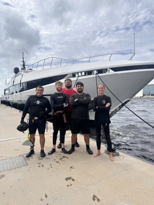 Barnacle King Takes on the Mangusta GranSport 54 in Fort Lauderdale - At Barnacle King, we’ve cleaned and detailed some of the finest yachts on the water, but every now and then, we get to work on something truly extraordinary. This week in Fort Lauderdale, our team had the honor of performing a full hull cleaning on one of only five Mangusta GranSport 54 yachts in existence.

A Rare Beauty on the Water
The Mangusta GranSport 54 is a masterpiece of Italian engineering—sleek, powerful, and built for speed and luxury. With only five in the world, seeing one up close is rare. Getting to service one? That’s next-level. At 177 feet long, this superyacht blends long-range capabilities with impressive speed, hitting over 30 knots while maintaining supreme comfort. When a yacht like this needs attention, only the best will do. That’s where Barnacle King comes in.

Why Hull Cleaning Matters—Even for a Superyacht
No matter how advanced a yacht is, it’s still vulnerable to the silent enemy of the sea: marine growth. Barnacles, algae, and biofouling can build up on the hull, impacting fuel efficiency, speed, and even the integrity of underwater components. A yacht like the Mangusta GranSport 54 isn’t just about luxury—it’s about performance. Keeping the hull in pristine condition ensures smooth sailing, lower fuel costs, and maximum speed.

The Barnacle King Process
Our expert divers arrived at the marina in Fort Lauderdale ready to give this rare vessel the royal treatment. Here’s how we tackled the job:

Pre-Dive Inspection – Before getting in the water, we conducted a full inspection of the hull using underwater cameras and sonar scanning to assess the level of growth and any potential problem areas.
Eco-Friendly Cleaning – We used specialized, non-toxic tools to remove barnacles, algae, and other marine buildup without damaging the yacht’s finish. Our team avoids harsh chemicals, ensuring that we protect both the vessel and the environment.
Propeller & Running Gear Detailing – A yacht like the Mangusta GranSport 54 demands peak performance. We cleaned and polished the propellers, shafts, and other underwater components to reduce drag and improve efficiency.
Final Check & Report – After cleaning, we conducted a post-service inspection to ensure every inch of the hull was flawless. We also provided the yacht’s crew with a detailed report, including before-and-after images.
Why Owners Trust Barnacle King
Yacht owners know that a clean hull means better performance and longevity. Our team brings years of experience, the latest diving technology, and an eco-conscious approach to every job. Whether it’s a 50-foot sportfishing boat or a 177-foot Mangusta GranSport 54, we treat every vessel with the highest level of care.

Sail Smooth, Go Fast, Stay Efficient
The owner of this exclusive yacht can now enjoy enhanced speed, improved fuel efficiency, and the peace of mind that comes with expert maintenance. A clean hull isn’t just about looks—it’s about keeping a high-performance yacht operating at its best.

If you’re a yacht owner in Fort Lauderdale or beyond, trust Barnacle King for premium hull cleaning and boat detailing. Whether you own a rare superyacht or a weekend cruiser, we’ll keep your vessel in peak condition. Book your service today and experience the Barnacle King difference!
