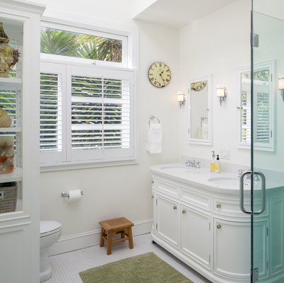 Home Addition - Converted unused garage storage and non existent space to create a lower level family room, expansive deck and remodeled master bath