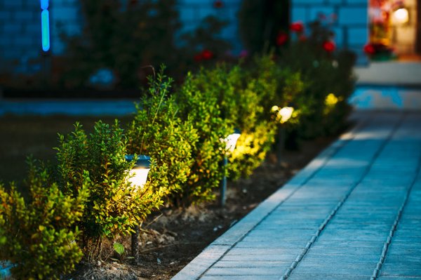 Landscape Lighting - Accentuate architectural features, highlight a well-tended garden or enhance outdoor living space all with artistically designed lighting.   We offer a wide variety of LED Lighting options to suit your needs:

    Path and Spread Lights- Raised lights that come in a variety of styles to compliment the architecture and landscaping of your home and increase the ambiance of your outdoor spaces. Guests will be able to easily see where they are going and will feel safe and comfortable no matter what time of day they are enjoying your home. 
    Well Lights- Recessed lights that can highlight your patio or deck area.
    Step and Brick Lights- These lights illuminate the path into and out of your outdoor entertainment areas so that you and your guests stay safe when walking along the pathways of your property.
    Bullet Lights