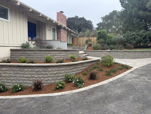 Landscape design & installation of front entrance and driveway. - Here we designed a new front entrance and driveway for this home in Monterey. Next we installed 3 retaining walls, asphalt and paver driveway, paver entrance walkway and steps, sod, irrigation and lighting. Landscape design & installation of front entrance and driveway. - Here we designed a new front entrance and driveway for this home in Monterey. Next we installed 3 retaining walls, asphalt and paver driveway, paver entrance walkway and steps, sod, irrigation and lighting.
