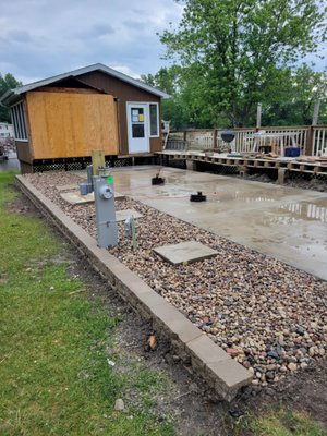 Water retention - This was a backyard project. A customer wanted to build a water retention area in his backyard so that it would not flood. We finished it off with some river stones. Water retention - This was a backyard project. A customer wanted to build a water retention area in his backyard so that it would not flood. We finished it off with some river stones.