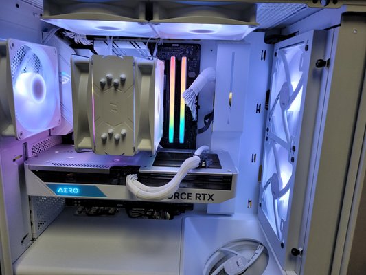 All White Build - An all-white gaming PC brings a unique aesthetic that sets it apart from the typical black or RGB-laden setups seen in many gaming spaces. If you're into creating a visually appealing gaming environment, the clean, minimalist vibe of an all-white rig can complement your room or gaming space while exuding a sense of elegance. Whether you're streaming on platforms like Twitch or simply want a display-worthy setup, an all-white computer is sure to catch the eye.
With its bright, neutral color, it pairs well with any RGB lighting you may have, allowing your setup to shine without the overwhelming clutter of dark tones. It creates a sense of sophistication, making it not only a powerhouse for performance but a centerpiece in your gaming space. All White Build - An all-white gaming PC brings a unique aesthetic that sets it apart from the typical black or RGB-laden setups seen in many gaming spaces. If you're into creating a visually appealing gaming environment, the clean, minimalist vibe of an all-white rig can complement your room or gaming space while exuding a sense of elegance. Whether you're streaming on platforms like Twitch or simply want a display-worthy setup, an all-white computer is sure to catch the eye.
With its bright, neutral color, it pairs well with any RGB lighting you may have, allowing your setup to shine without the overwhelming clutter of dark tones. It creates a sense of sophistication, making it not only a powerhouse for performance but a centerpiece in your gaming space.
