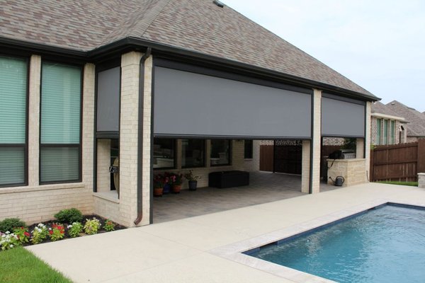 Retractable Screens - Expand your living space seamlessly with our cutting-edge patio screening solutions. Bluebonnet Patio Covers brings you customized Retractable Screen Solutions, crafted with unparalleled strength and durability. Experience the outdoors like never before while keeping sun and insects at bay.