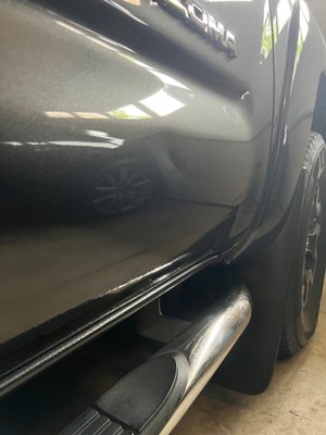 Before and after - Dent in right front door. It came out like it never happened.