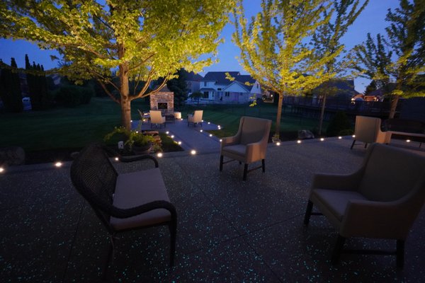 Exposed Aggregate Patio with Glow Stones - Here we installed a beautiful exposed aggregate patio & fire pit with glow stones & LED lights.