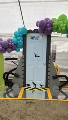 Monster’s Inc Birthday - At Neida’s Event Decor, we brought a "Monsters, Inc." theme to life for a client's event, and it was an absolute hit! One of the standout features was our custom-built Monsters, Inc. door. This wasn’t just any door—it was fully customizable to fit the client’s vision, with a functioning canister and light that added an interactive and playful element to the decor. Our team designed and built this unique piece in-house, ensuring that every detail was perfect. It was the perfect way to immerse guests in the fun world of Monsters, Inc., while giving the event a personal touch. Monster’s Inc Birthday - At Neida’s Event Decor, we brought a "Monsters, Inc." theme to life for a client's event, and it was an absolute hit! One of the standout features was our custom-built Monsters, Inc. door. This wasn’t just any door—it was fully customizable to fit the client’s vision, with a functioning canister and light that added an interactive and playful element to the decor. Our team designed and built this unique piece in-house, ensuring that every detail was perfect. It was the perfect way to immerse guests in the fun world of Monsters, Inc., while giving the event a personal touch.
