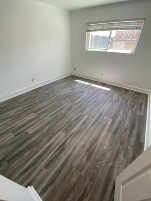 Rental Unit Remodel - This rental unit was in need of new flooring ! Replaced the laminate with brand new SPC flooring. SPC is perfect for rental units, its scratch resistant and water-proof. Moldings such as baseboard and base shoe were replaced as well.