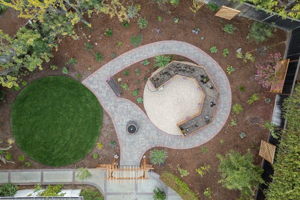 ⭐ Featured & Published ⭐ Saratoga Large-Scale Backyard & Garden Remodel - Call us at (844) 306-8953 for your outdoor transformation! This large backyard renovation in Saratoga seamlessly blends backyard landscaping with hardscaping elements. A paver patio and paver walkways create a durable, visually appealing foundation for relaxation and entertainment. The carefully planned landscape design integrates lush greenery with a fresh grass install, bringing balance and softness to the structured hardscape.

A standout feature of this backyard remodel is the custom wooden planter box, perfect for growing vegetables or flowers while adding a rustic touch to the space. Step lighting enhances the ambiance and ensures safety in the evening, illuminating key pathways and steps. Every element of this backyard design was carefully curated by our team, ensuring a functional and aesthetically pleasing retreat.

This Bay Area landscape design maximizes space while maintaining a natural, inviting feel—an ideal setting for gatherings, relaxation, and enjoying the beauty of a well-crafted backyard landscaping project.

Opulands is a family-owned Bay Area company specializing in comprehensive landscape and hardscape design and installation. We transform outdoor spaces into stunning retreats by blending softscaping elements like lawns and gardens with hardscaping features such as paver driveways, patios, and outdoor kitchens. Our team is dedicated to creating functional and opulent environments that enhance your lifestyle. Experience the beauty and functionality of a meticulously designed outdoor space. Call us today at 844-306-8953 for more information.