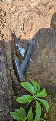 Redmond sewer job - someone had ran the rain drain into to sewer line and made a shady connection which was causing it to back up, had to cut it out and run it