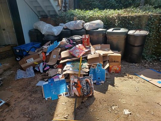 Backyard Clean-up - Sometimes trash and boxes accumulate faster than our waste bins can accommodate them. When that pile in your back yard is taking on a life of it's own, give Junk King a call! Backyard Clean-up - Sometimes trash and boxes accumulate faster than our waste bins can accommodate them. When that pile in your back yard is taking on a life of it's own, give Junk King a call!