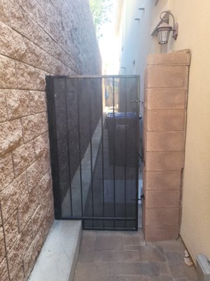 Gate repair - Customer reached out asking to repair his gate and reinstall the top hinge. I suspected something larger may be in play having seen the picture sent to me in the service request. Come to find out the block pilaster holding the gate up was broken midway up along a mortar joint. The builder didn't properly lap the rebar and this resulted in a complete failure. We decided to put a metal fence matching the gate back in its place.
