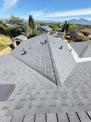 Pleasant Hill - Timing and precision were key for this recent roofing project in Pleasant Hill! The homeowner was wrapping up a new addition and needed their new roof installed the moment that project finished. We scheduled in advance to be ready the week of the project completion so that we could get the property fully protected without delay.

This job required some expert craftsmanship. The home had a carport with brand-new shingles already installed, so our team carefully and seamlessly wove the new roof into the existing carport roof for a flawless look. To ensure the new addition had the ultimate water protection—especially where the roof valleys connected directly to interior walls—we installed TPO in the valleys to prevent any future leaks.

We completed the entire roof replacement using our most popular shingle choice: CertainTeed Landmark shingles in Moire Black, giving the home incredible durability and a stunning modern look.

Looking for a highly skilled roofing contractor who can handle complex integrations and advanced waterproofing? Contact Affordable Roofing Systems today!