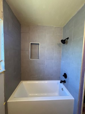 Bathtub replacement. - Replace a damaged bathtub with new unit. Bathtub replacement. - Replace a damaged bathtub with new unit.