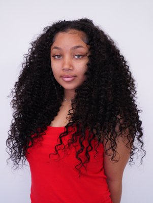 Textured Curly Clip-ins - Our client wanted longer curly hair due to her hair not growing. Our stylist texture matched & installed 1 pack of 20 inch Tight Curly Clip-ins and 1 pack of 20 inch Curly Clip-ins. Mixing to curly patterns gave her a more flawless natural blend. This service is our Clip-in Installation Service. This service include install, cut, and style for a starting price of $100. 

*Price of hair is not included with services