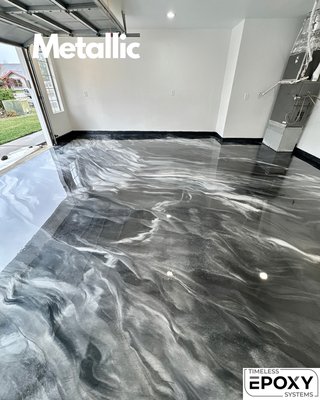 Metallic Epoxy Floors - Metallic epoxy coating is our ultimate designer floor option. Here’s an example of a garage where we completely transformed this space.