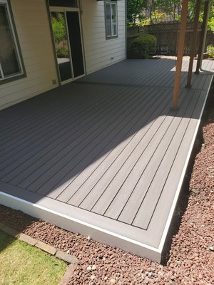 Picture framed deck - Vancouver, WA - This deck was in bad shape, so we completely removed the old structure and started from scratch. Azek decking with a 50 year warranty and double picture framed with painted 5/4" fascia to match the existing trim. This looks amazing, and has so much detail. Picture framed deck - Vancouver, WA - This deck was in bad shape, so we completely removed the old structure and started from scratch. Azek decking with a 50 year warranty and double picture framed with painted 5/4" fascia to match the existing trim. This looks amazing, and has so much detail.