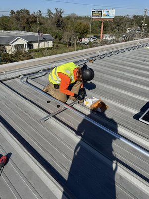 Solar Installation - Apprentice Stephen Vagianos putting in the work and getting it done! Wrapping up a three-inverter solar installation with TR Electric, fully geared up in all his PPE for safety. Another step toward a greener future, powered by skill and dedication! Solar Installation - Apprentice Stephen Vagianos putting in the work and getting it done! Wrapping up a three-inverter solar installation with TR Electric, fully geared up in all his PPE for safety. Another step toward a greener future, powered by skill and dedication!