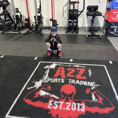 Youth and Performance Training Programs - Are you looking for a fun and effective way to keep your kids active, healthy, and engaged? Join our Performance Training Classes at A2Z Sports Training! Designed specifically for young athletes, our classes focus on building strength, agility, and overall fitness in a supportive and energetic environment.
Our expert coaches specialize in youth training, ensuring each session is not only beneficial but also safe and age-appropriate. We believe in nurturing a lifelong love for fitness and sports, helping kids develop healthy habits that will serve them for years to come.
From improving sports performance to boosting confidence and social skills, our classes provide a well-rounded approach to physical and mental well-being. With a variety of exercises and fun challenges, we keep the kids motivated and excited about staying active.
Enroll your child today and watch them grow stronger, healthier, and more confident with every session! Youth and Performance Training Programs - Are you looking for a fun and effective way to keep your kids active, healthy, and engaged? Join our Performance Training Classes at A2Z Sports Training! Designed specifically for young athletes, our classes focus on building strength, agility, and overall fitness in a supportive and energetic environment.
Our expert coaches specialize in youth training, ensuring each session is not only beneficial but also safe and age-appropriate. We believe in nurturing a lifelong love for fitness and sports, helping kids develop healthy habits that will serve them for years to come.
From improving sports performance to boosting confidence and social skills, our classes provide a well-rounded approach to physical and mental well-being. With a variety of exercises and fun challenges, we keep the kids motivated and excited about staying active.
Enroll your child today and watch them grow stronger, healthier, and more confident with every session!