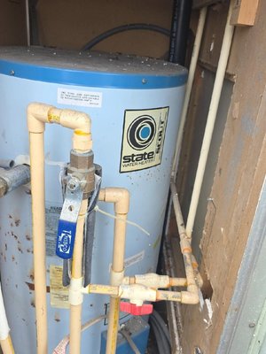 water heater - New water heater installed in a challenging tight space—excellent craftsmanship and attention to detail.