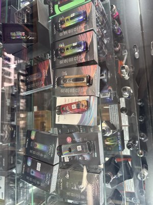 Pod Devices - Smoke Villa: Your Go-To Spot for Pod Devices
At Smoke Villa, we specialize in bringing you the best in vaping innovation—including a full range of pod devices that combine power, style, and user-friendly operation. Whether you’re upgrading from disposable vapes, switching from traditional cigarettes, or looking for a compact device for everyday use, our pod systems deliver unmatched satisfaction and convenience.

Why Choose Pod Devices from Smoke Villa?
Sleek & Portable:
Pod devices are compact, lightweight, and stylish—perfect for slipping into a pocket or bag for vaping on the go.
Simple Operation:
Refillable pods and replaceable cartridges make maintenance easy—just pop in a new pod or refill with your favorite e-liquid. No messy coil swaps required for most models.
Versatile Vaping Experience:
Enjoy options suited for both mouth-to-lung (MTL) and direct-to-lung (DTL) vaping. Adjust airflow, wattage, and other settings for a personalized session.
Ideal for Nicotine Salts:
Pod systems pair perfectly with nicotine salt e-liquids, offering a smooth and satisfying hit that’s similar to the feel of traditional smoking.
Affordable & Efficient:
Entry costs are low and e-liquid usage is efficient, making pod devices a budget-friendly option for both new and experienced vapers.
Our Pod Device Selection
Find the industry’s leading pod brands and latest models, including:

SMOK Nord & Novo Series
Vaporesso XROS
Uwell Caliburn
Voopoo Vinci & Drag Nano
GeekVape Sonder & Wenax
...and many more!
All products are authentic and backed by manufacturer warranties for your peace of mind.

Accessories & Support
We offer a full range of compatible pods, coils, charging cables, and protective cases. Not sure which pod or coil works for your device? Our team will match you with the right components and provide care and maintenance tips for optimal performance.

Expert Advice, Every Visit
Whether you’re new to vaping or a seasoned pro, our staff listens to your preferences and guides you to the best device for your lifestyle—explaining features, helping with setup, and providing troubleshooting whenever you need it.

Smoke Villa: Innovation, quality, and support—all tailored for the modern vaper.

Stop by or call us today to see our latest pod device arrivals, flavor pairings, and exclusive in-store offers!