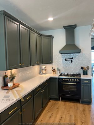 Kitchen Remodel 2023 - This remodel was done on an old Kitchen that wasn't practical, and dated.
we did some re-layout for the kitchen, canceled a small Island, oven, and microwave cabinet, did a lot of customization in the cabinets next to the fridge to fit the pull-out microwave into it, and Multiple coats of Professional paint, with new Georges Quarts countertops, simple backsplash to work very well with the unique cabinet color, and the brand-new waterproof wood floor all over the house, a professional Plumbing work done with the nice electrical work to accommodate all this nice changing, and. Enjoy the Result Kitchen Remodel 2023 - This remodel was done on an old Kitchen that wasn't practical, and dated.
we did some re-layout for the kitchen, canceled a small Island, oven, and microwave cabinet, did a lot of customization in the cabinets next to the fridge to fit the pull-out microwave into it, and Multiple coats of Professional paint, with new Georges Quarts countertops, simple backsplash to work very well with the unique cabinet color, and the brand-new waterproof wood floor all over the house, a professional Plumbing work done with the nice electrical work to accommodate all this nice changing, and. Enjoy the Result
