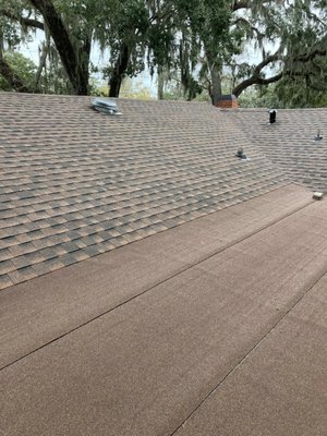 Hickory roof install, with flat roof - Client hired an out of town roofer who installed the valleys incorrectly, causing water to be funneled into the home every time it rained, and caused the boards around to rot. We replaced the roof with new Hickory Architectural shingles, after replacing all of the rotting wood. We installed Hickory Cap Sheet over the porch for client on a 2/12 slope. Hickory roof install, with flat roof - Client hired an out of town roofer who installed the valleys incorrectly, causing water to be funneled into the home every time it rained, and caused the boards around to rot. We replaced the roof with new Hickory Architectural shingles, after replacing all of the rotting wood. We installed Hickory Cap Sheet over the porch for client on a 2/12 slope.