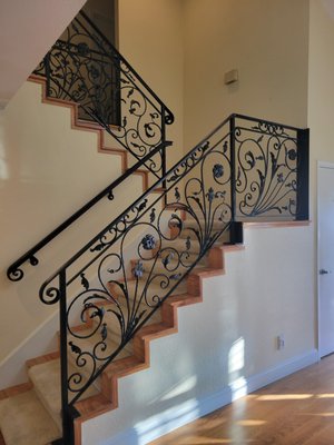 Handmade Forge Custom Build Railing Remodel - This client from Belmont wanted to remove their wood/iron railing and replace them with a custom built forge railing.