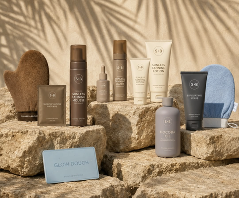 Take the Glow on the Go - Our collection of skin care and sunless tanning products is designed to keep your skin smooth, hydrated, and bronzed between appointments and beyond. From exfoliating and ingrown care to nourishing oils and at-home tanning essentials, each product makes it easy to bring the S+B glow into your everyday routine. Whether you’re maintaining your airbrush tan, prepping your skin, or creating a sunless glow at home, we’ve got you covered. Take the Glow on the Go - Our collection of skin care and sunless tanning products is designed to keep your skin smooth, hydrated, and bronzed between appointments and beyond. From exfoliating and ingrown care to nourishing oils and at-home tanning essentials, each product makes it easy to bring the S+B glow into your everyday routine. Whether you’re maintaining your airbrush tan, prepping your skin, or creating a sunless glow at home, we’ve got you covered.