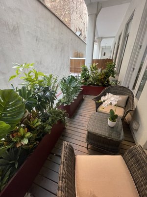 Balcony design - We were asked to give this balcony a new look! The owner needs a plant decoration that will survive throughout the year so we went with a selection of artificial plants and preserved moss. Balcony design - We were asked to give this balcony a new look! The owner needs a plant decoration that will survive throughout the year so we went with a selection of artificial plants and preserved moss.