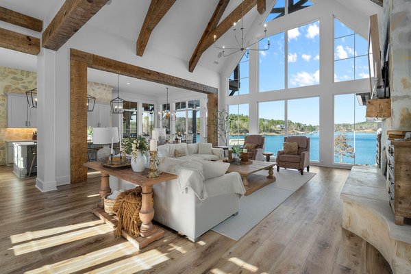 Custom Smith Lake Home Build - This custom home was designed to bring the outdoors in, with soaring ceilings, exposed timber beams, and walls of glass that frame breathtaking water views from nearly every room. The open-concept kitchen and living space create the perfect setting for entertaining, featuring a stunning oversized island, custom cabinetry, and warm natural finishes throughout.
From the inviting bunk room built for making memories, to the cozy yet elevated bedrooms with bold architectural details, every space in this home was thoughtfully crafted with both comfort and style in mind. The blend of rustic textures—stone, wood, and metal—paired with clean, modern lines creates a timeless lake house aesthetic.
Step outside and you’ll find a home that sits beautifully along the shoreline, offering unmatched views, privacy, and a true connection to the natural landscape of Smith Lake Alabama.
This is more than a home—it’s a retreat designed for gathering, relaxing, and living the lake lifestyle to the fullest.
Full video tour can be found on our YouTube page, @cornerstoneconstruction6760. Custom Smith Lake Home Build - This custom home was designed to bring the outdoors in, with soaring ceilings, exposed timber beams, and walls of glass that frame breathtaking water views from nearly every room. The open-concept kitchen and living space create the perfect setting for entertaining, featuring a stunning oversized island, custom cabinetry, and warm natural finishes throughout.
From the inviting bunk room built for making memories, to the cozy yet elevated bedrooms with bold architectural details, every space in this home was thoughtfully crafted with both comfort and style in mind. The blend of rustic textures—stone, wood, and metal—paired with clean, modern lines creates a timeless lake house aesthetic.
Step outside and you’ll find a home that sits beautifully along the shoreline, offering unmatched views, privacy, and a true connection to the natural landscape of Smith Lake Alabama.
This is more than a home—it’s a retreat designed for gathering, relaxing, and living the lake lifestyle to the fullest.
Full video tour can be found on our YouTube page, @cornerstoneconstruction6760.