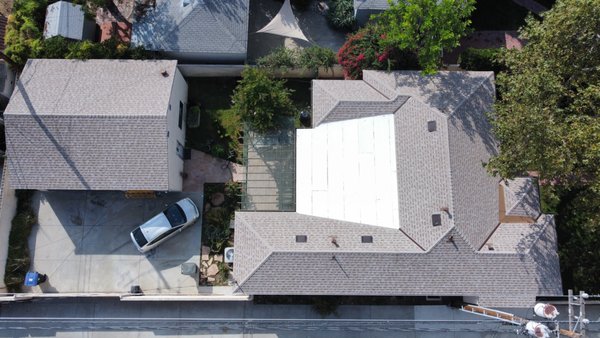Asphalt Shingles with flat roof in between - Asphalt Shingles cool roof installation and Polyfresko by Polyglass USA White cool roof installation with “Elastoflex SA” waterproof peel and stick underlayment. Asphalt Shingles with flat roof in between - Asphalt Shingles cool roof installation and Polyfresko by Polyglass USA White cool roof installation with “Elastoflex SA” waterproof peel and stick underlayment.