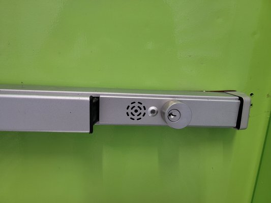 Push-Bar Installation - A new push-bar installation on a commercial metal door. Push-Bar Installation - A new push-bar installation on a commercial metal door.