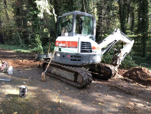 Underground Utility installation- water and propane - Performed a full underground utility installation for both water and propane service to a residential property. Excavated and installed approximately 250 feet of new 2” water main and 50 feet of 1” propane gas line, trenched to proper code-compliant depth and separation.
Set, leveled, and bedded a 250-gallon propane tank, then routed both the water and propane lines through the garage and tied them into the existing main water line and propane system at the home using approved fittings and shutoff valves. All trenches were properly backfilled and compacted, leaving a clean, safe installation designed for long-term reliability. Underground Utility installation- water and propane - Performed a full underground utility installation for both water and propane service to a residential property. Excavated and installed approximately 250 feet of new 2” water main and 50 feet of 1” propane gas line, trenched to proper code-compliant depth and separation.
Set, leveled, and bedded a 250-gallon propane tank, then routed both the water and propane lines through the garage and tied them into the existing main water line and propane system at the home using approved fittings and shutoff valves. All trenches were properly backfilled and compacted, leaving a clean, safe installation designed for long-term reliability.