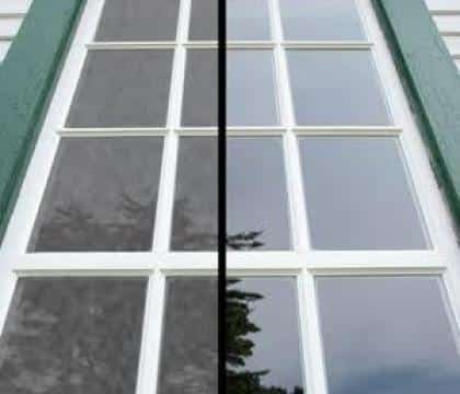 Window cleaning - A full house window washing scrubbing dirt from the frames with no sounds Window cleaning - A full house window washing scrubbing dirt from the frames with no sounds