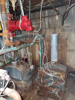 Old Boiler System to a new system - This shows the expertise, knowledge and engineering efforts of our installation team. This old, dilapidated boiler was in pathetic shape! The honest, professional experts at McVay did a fantastic job replacing the system with a new, modern, efficient system! Old Boiler System to a new system - This shows the expertise, knowledge and engineering efforts of our installation team. This old, dilapidated boiler was in pathetic shape! The honest, professional experts at McVay did a fantastic job replacing the system with a new, modern, efficient system!