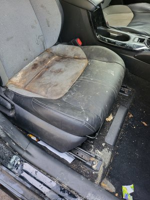 Food stains & pet hair - This vehicle is used by someone who does catering delivery.