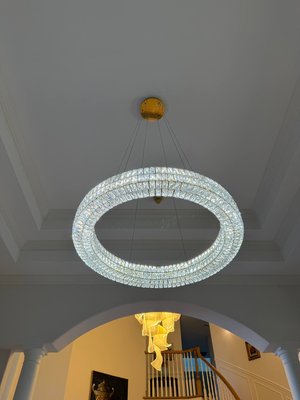 Chandelier Installation – High Ceiling - Installed a modern chandelier in a high-ceiling foyer, including secure mounting, proper wiring, and alignment. This upgrade added style, brightened the entryway, and created a luxury look for the home.