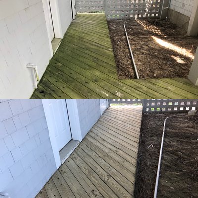Deck Cleaning in Coralla, NC - This is a perfect example of the type of algae buildup that can happen on the decks of your rental property overtime. These create very dangerous slip hazards and liabilities for investment property owners. Our services take care of these problems in just a few hours.