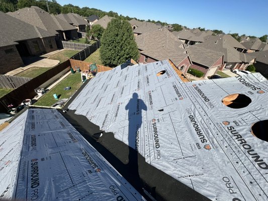 Yukon roof project - Installed a complete Owens Corning Duration TruDefinition roofing system in Driftwood, Class 3 impact resistant shingles. Roofing system includes Rizer Ridge, W-valley metal, ice and water shield installed in all valleys, hips, and rake edges for enhanced moisture protection and durability. System also includes starter strip, synthetic underlayment, drip edge, pipe flashings, and proper ventilation components installed per manufacturer specifications and industry standards.