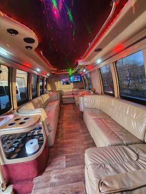 Ford Party bus - Wraparound seats, TVs, great sound system, restroom on board. Ford Party bus - Wraparound seats, TVs, great sound system, restroom on board.