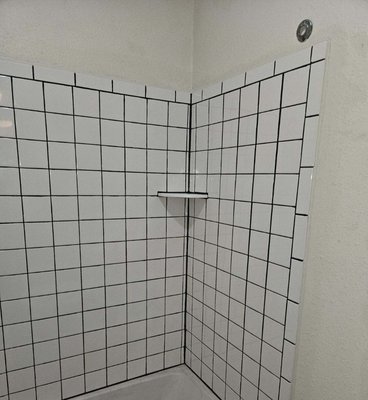 Bathroom walls and kitchen countertop renovation - Renovations in a bathroom removed the old and damaged tile, installed the new tile. Replaced the kitchen countertop (sink area)