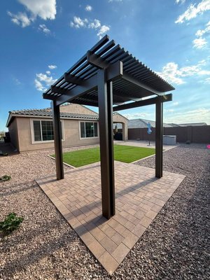 From Bare Ground to Backyard Retreat - What began as an empty dirt yard is now a complete outdoor living space. With lush artificial turf, beautifully installed paver steps and patio, and a stunning pergola as the centerpiece, this renovation transformed the backyard into a space that's as functional as it is beautiful. From Bare Ground to Backyard Retreat - What began as an empty dirt yard is now a complete outdoor living space. With lush artificial turf, beautifully installed paver steps and patio, and a stunning pergola as the centerpiece, this renovation transformed the backyard into a space that's as functional as it is beautiful.