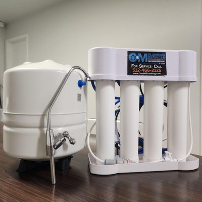 Whole Home Water Filtration System - With the water that comes into Austin and its surrounding communities, having a Whole Home Water Filtration System from O&M Plumbing will ensure that you have clean, healthy, and safe drinking water for your family, pets, and plants. Your hair will feel healthier, your laundry will be softer, and you will see less spots on your dishes and shower doors. A Whole Home Water Filtration System will help get rid of the contaminants coming into your home and will prolong the life of water dependent appliances like water heaters and refrigerators, as well. Take the next step to cleaner and healthier water! Whole Home Water Filtration System - With the water that comes into Austin and its surrounding communities, having a Whole Home Water Filtration System from O&M Plumbing will ensure that you have clean, healthy, and safe drinking water for your family, pets, and plants. Your hair will feel healthier, your laundry will be softer, and you will see less spots on your dishes and shower doors. A Whole Home Water Filtration System will help get rid of the contaminants coming into your home and will prolong the life of water dependent appliances like water heaters and refrigerators, as well. Take the next step to cleaner and healthier water!