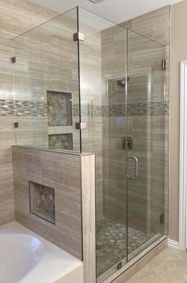 Corner Showers - Examples of Corner Showers installed by Blueprint Frameless Showers, call today for your shower glass.