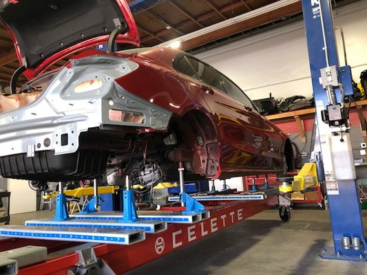 Jig setup - We use celette bench to anchor and re-align vehicles back to the manufacturers specs Jig setup - We use celette bench to anchor and re-align vehicles back to the manufacturers specs