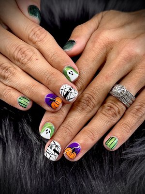 Halloween Nail Design - Halloween is just around the corner, and it's time to get your nails ready for the spookiest night of the year! 🎃👻💅 Our expert nail technicians are here to help you create a hauntingly beautiful nail design that'll make you the envy of the monster mash. Book your appointment today!

Let me know if you'd like more options!