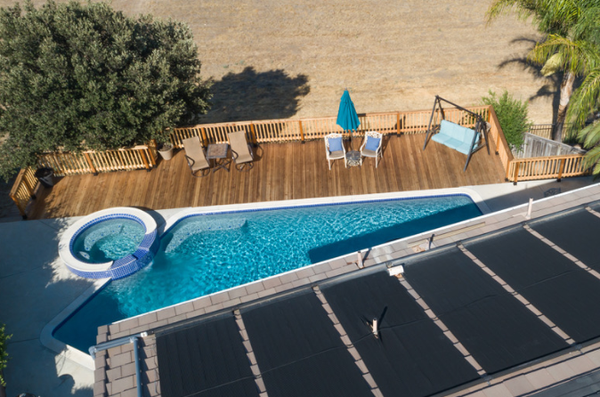 Solar Heating for Your Salt Pool! - Solar Heating For Your Pool
You can save you lots of money and conserve our precious resources by reducing the need for oil or gas. Your pool solar heating can work independently or with your present pool heater. The cost to operate pool solar is nothing. Your existing pool pump sends the water thru the solar panels, the sun does the rest.
How Does it Work?
Solar panels are put on your roof to collect the energy from the sun, south facing direction is preferred. After installation, to heat your pool you will only need to set the automatic solar thermostat control unit for the desired water temperature. What happens then:
The roof sensor detects heat from the sun and tells the control unit to send pool water thru the solar panels. This is automatic once you set your temperature on the controller.
Your pool pump sends cold water from the pool through the solar collectors.
The solar collectors transfer the sun’s heat to the water as if flows through the collectors.
Warm, solar-heated water flows back to the pool, continuously circulating through the collectors until it reaches your pre-set temperature levels. At night and in limited sunshine, a sensor prevents the pool from being cooled by automatically triggering the controller to shut off the system and drain water from the collectors.
State tax deductions are available for solar heating units. Contact your tax advisor for details. Solar Heating for Your Salt Pool! - Solar Heating For Your Pool
You can save you lots of money and conserve our precious resources by reducing the need for oil or gas. Your pool solar heating can work independently or with your present pool heater. The cost to operate pool solar is nothing. Your existing pool pump sends the water thru the solar panels, the sun does the rest.
How Does it Work?
Solar panels are put on your roof to collect the energy from the sun, south facing direction is preferred. After installation, to heat your pool you will only need to set the automatic solar thermostat control unit for the desired water temperature. What happens then:
The roof sensor detects heat from the sun and tells the control unit to send pool water thru the solar panels. This is automatic once you set your temperature on the controller.
Your pool pump sends cold water from the pool through the solar collectors.
The solar collectors transfer the sun’s heat to the water as if flows through the collectors.
Warm, solar-heated water flows back to the pool, continuously circulating through the collectors until it reaches your pre-set temperature levels. At night and in limited sunshine, a sensor prevents the pool from being cooled by automatically triggering the controller to shut off the system and drain water from the collectors.
State tax deductions are available for solar heating units. Contact your tax advisor for details.
