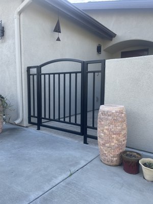 Exterior Gate - This customer was in need of a new exterior Gate with side panels. Adds safety and beautiful decor, powder coated to customer's choice of color.